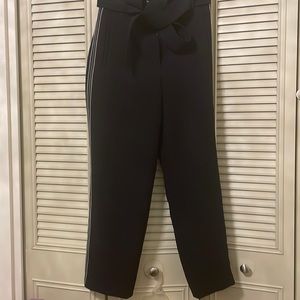 Wilfred black dress pants with white piping.Looks great for work or evening out.